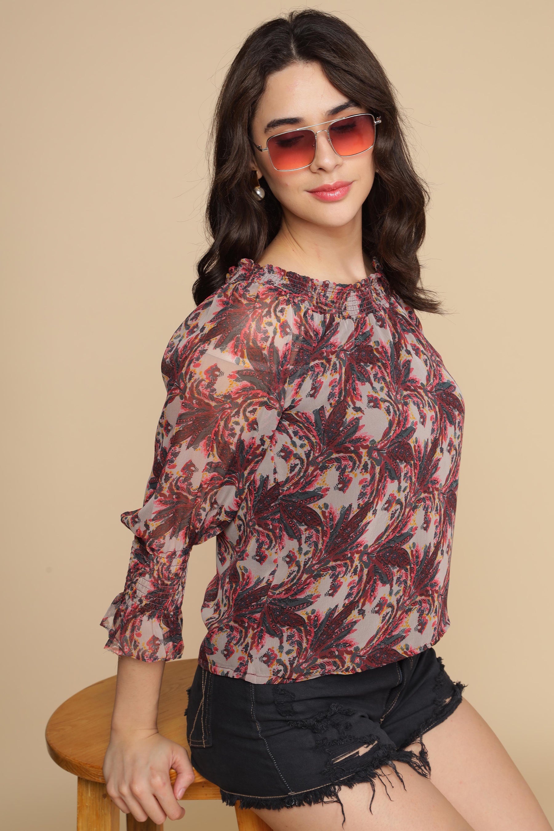 Stylish multi off-shoulder top with floral print and ruffled sleeves.