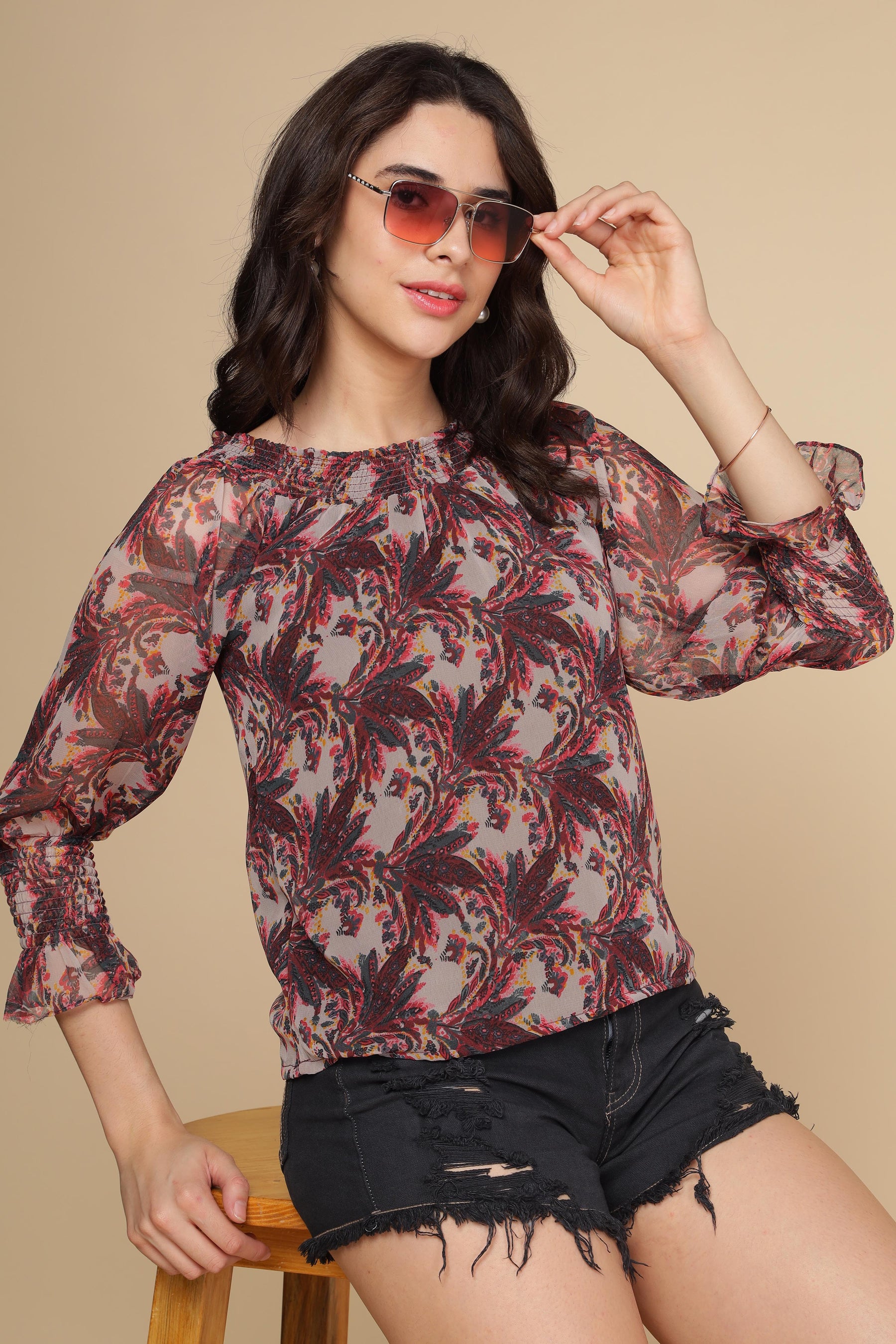 Stylish multi off-shoulder top with floral print and fluted sleeves.