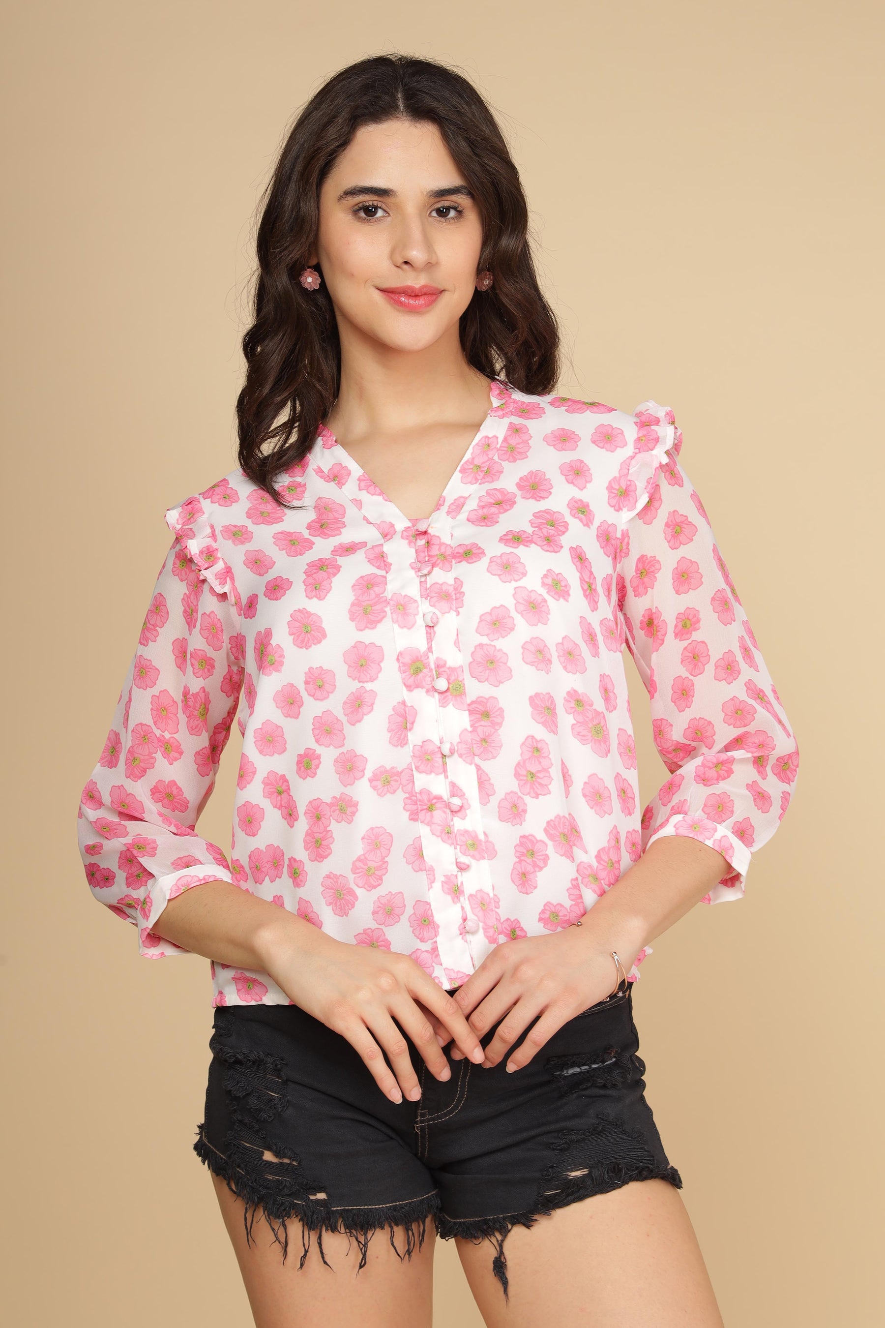 PINK RUFFLE FLORAL TOP with pink floral pattern and ruffled sleeves.