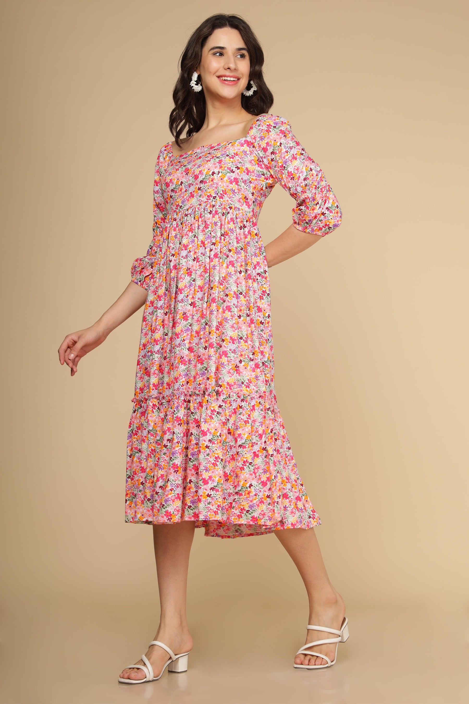 White floral cotton maxi dress on model, perfect for summer outings.