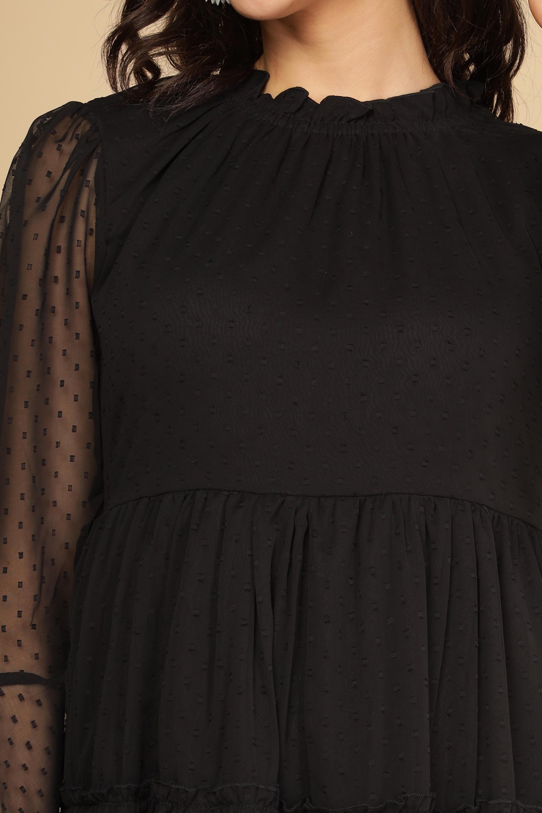 Elegant little black chiffon midi dress with stylish sheer sleeves.