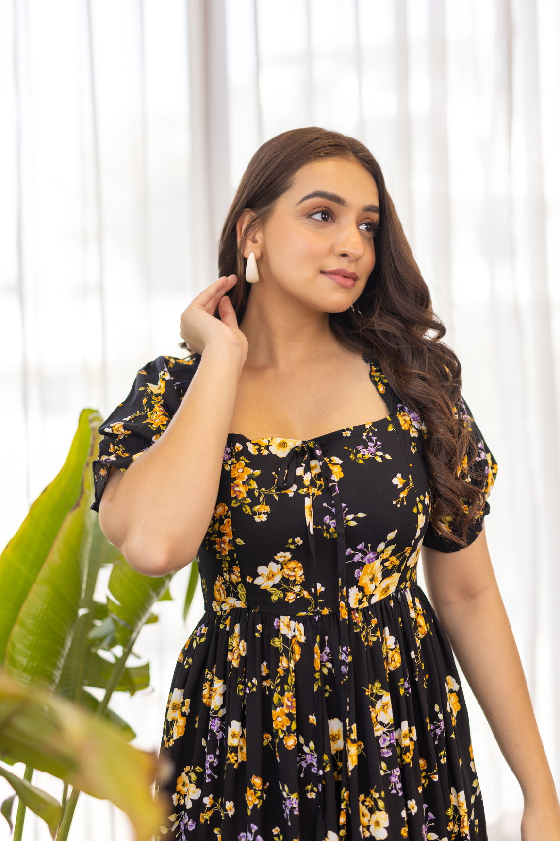 Elegant black floral nursing maxi dress for stylish mothers.