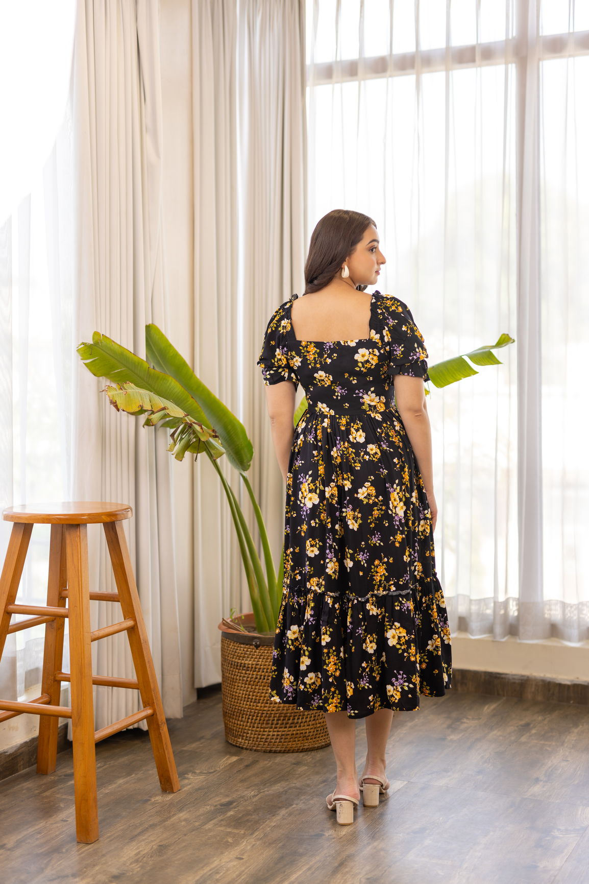 Black floral nursing maxi dress with puff sleeves, elegant and comfortable.