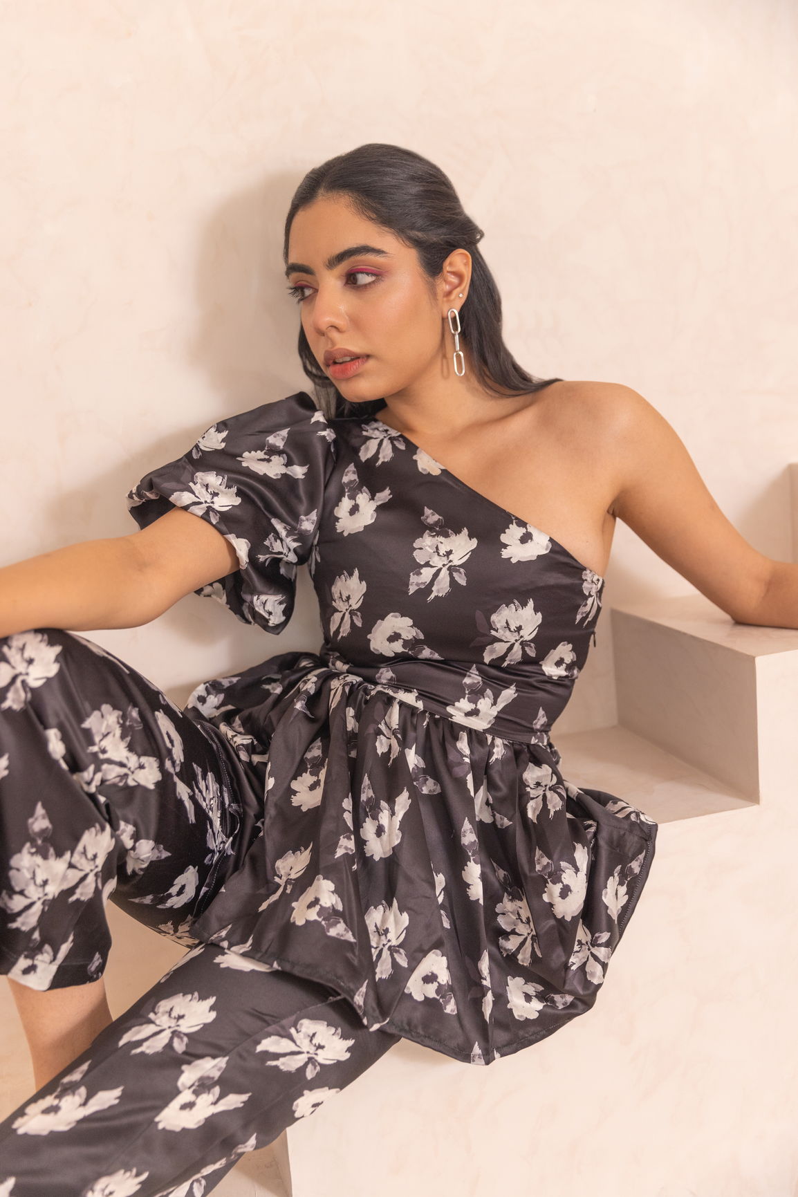 Black floral satin co-ord with stylish one-shoulder design.