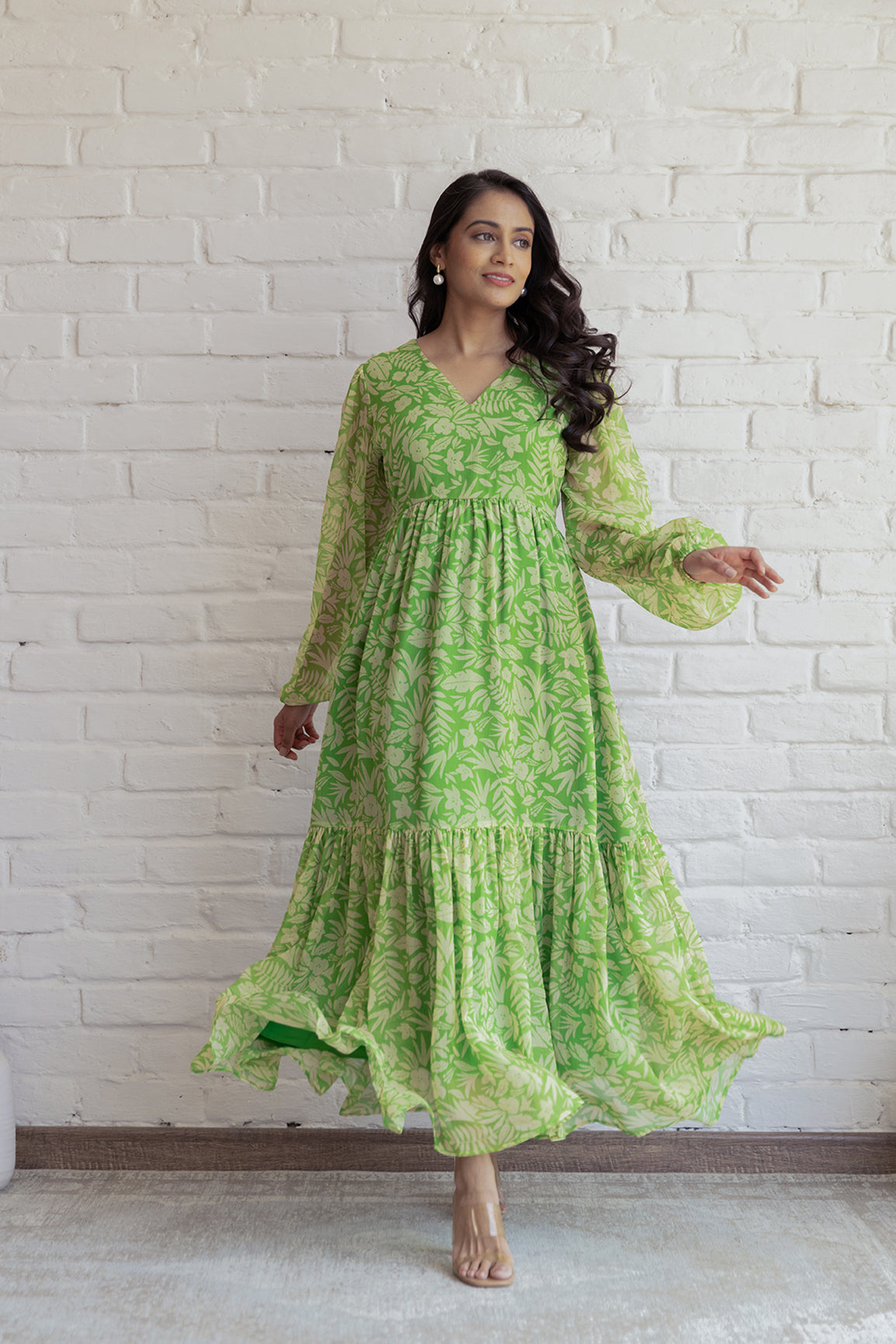 Green and yellow floral maxi dress, stylish and flowy design.