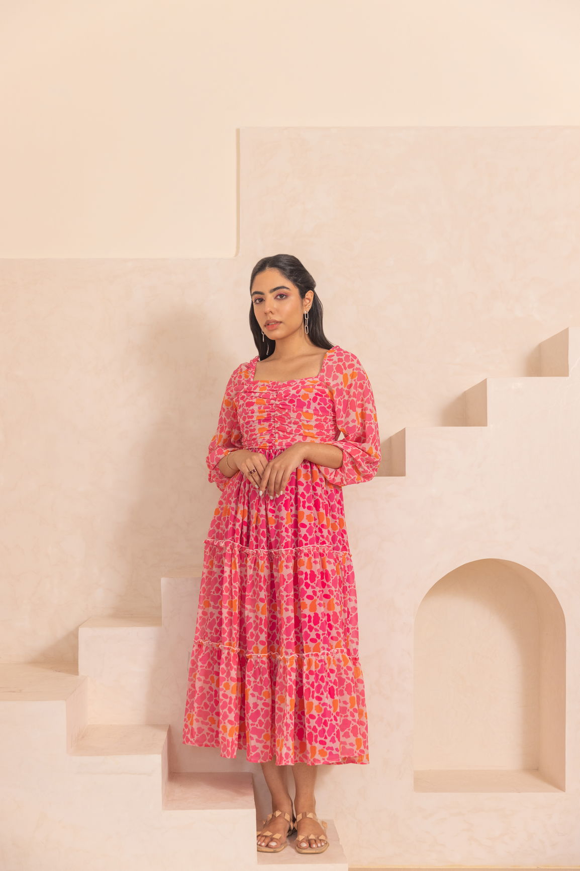 Model wearing MOSAIC PRINT MAXI dress in bright pink hues.