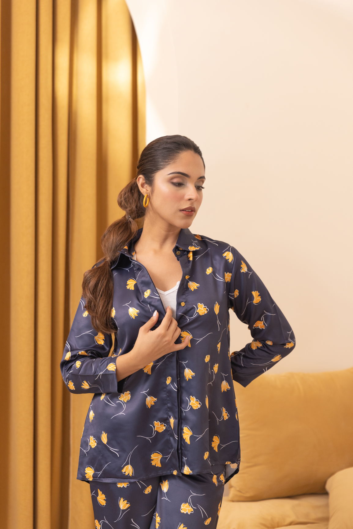 Navy satin co-ord set featuring floral print and stylish design.