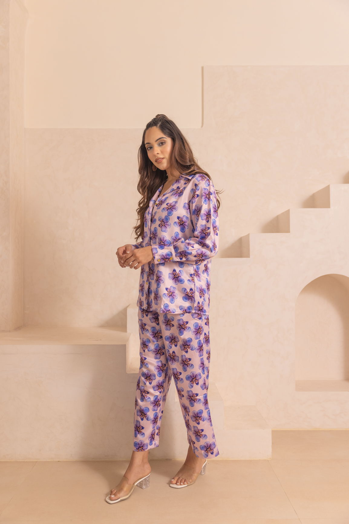 Pastel satin co-ord set featuring floral design and stylish model.