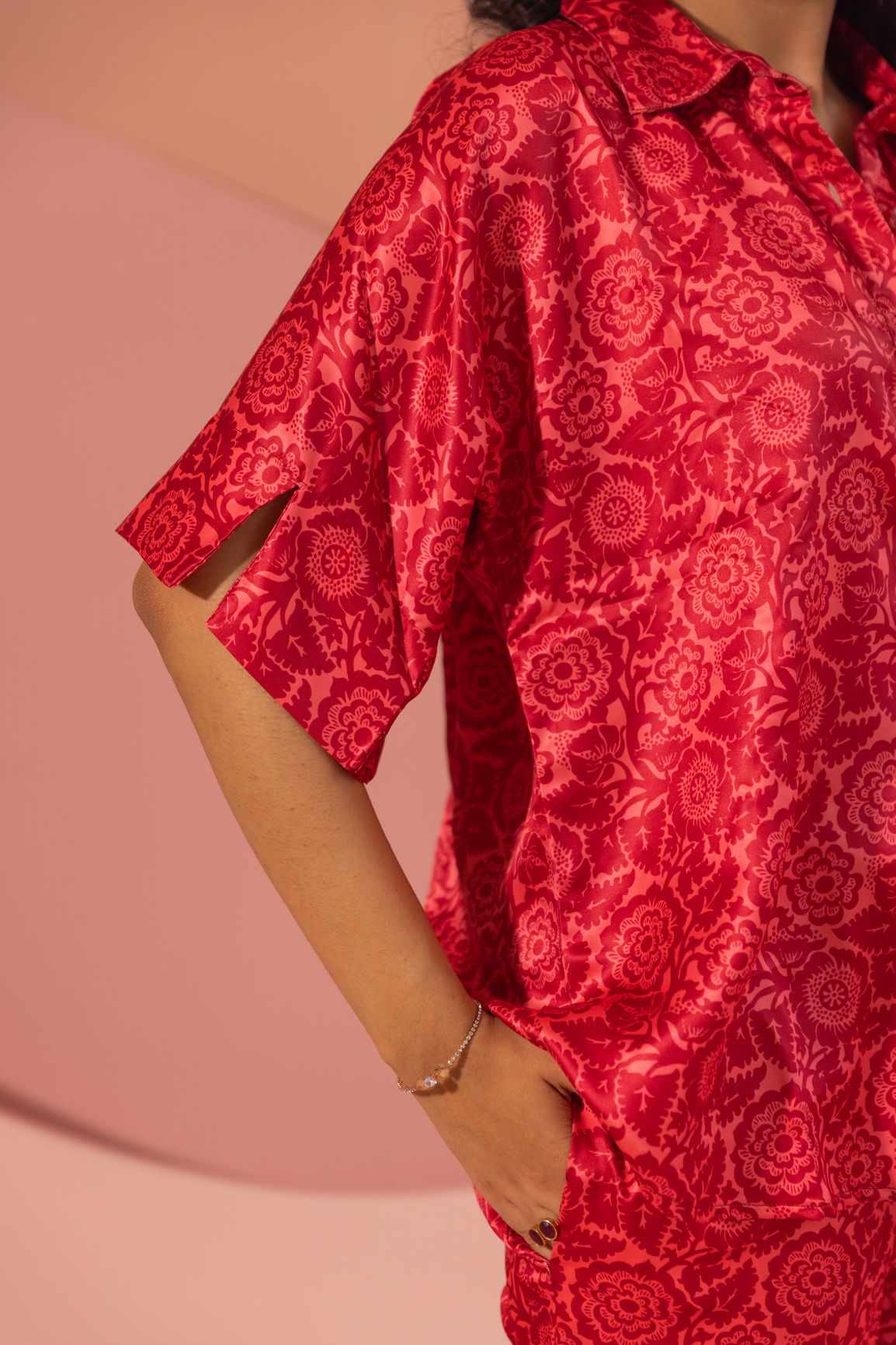 Stylish pink satin co-ord set with floral pattern, perfect for casual wear.