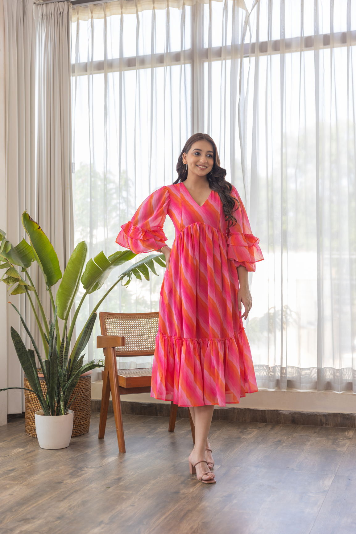 Pink wave nursing maxi dress with ruffled sleeves in bright colors.