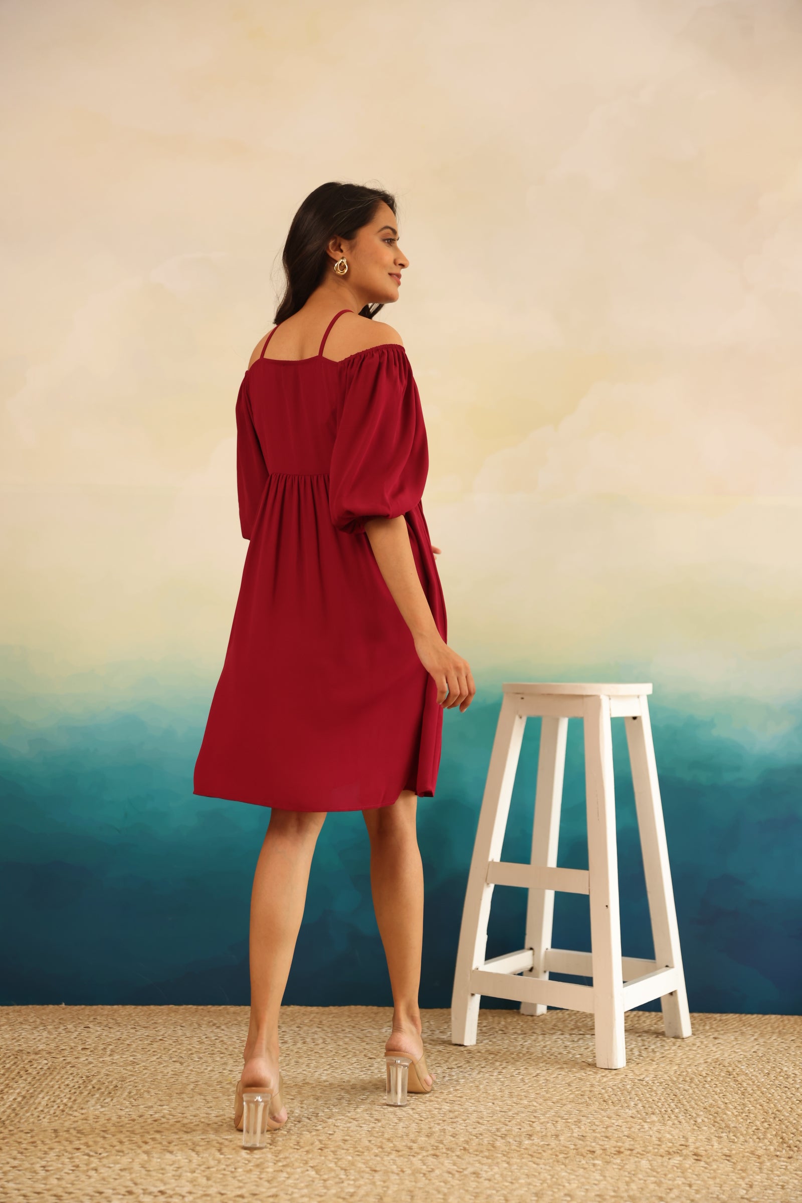 Burgundy midi dress with puff sleeves and back view model display.