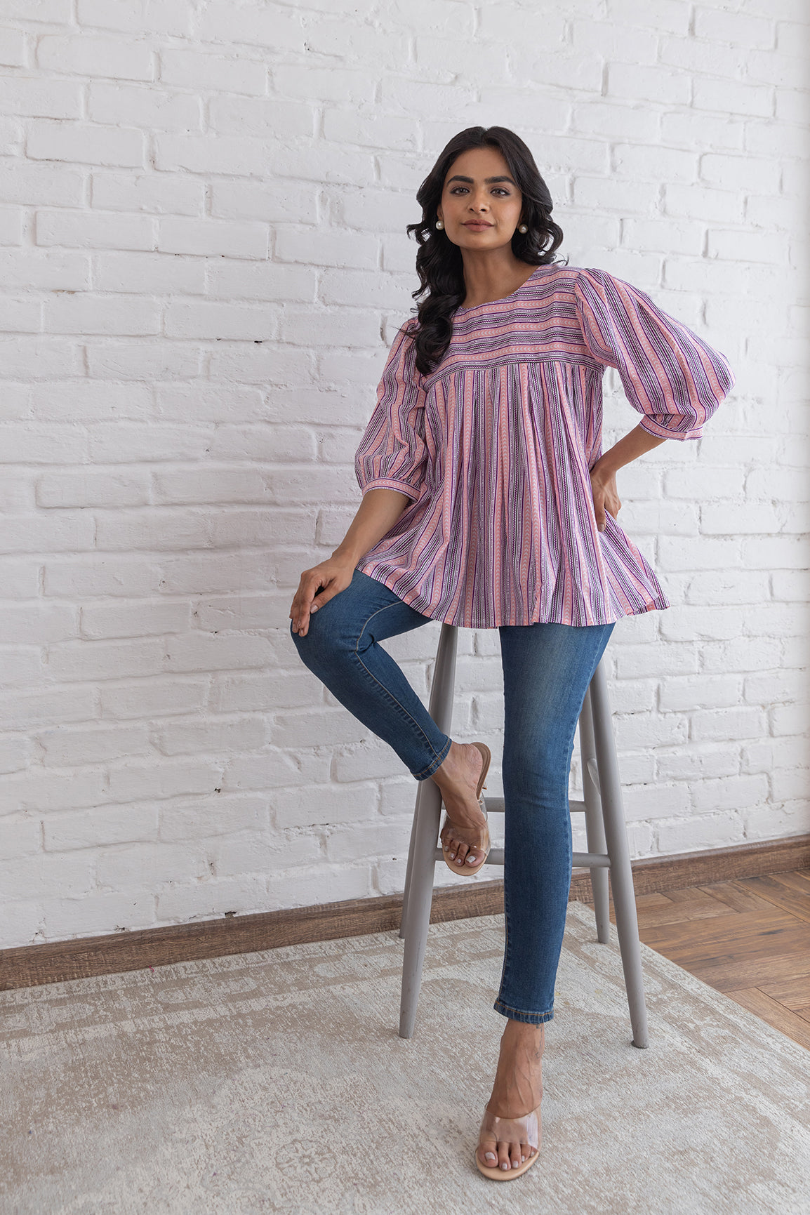 PINK STRIPED COTTON TOP worn with jeans and sandals.