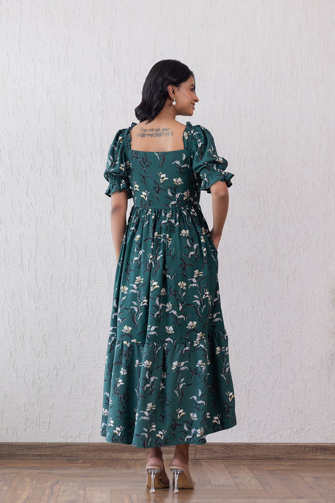 Green cotton nursing maxi dress with floral design and puff sleeves.