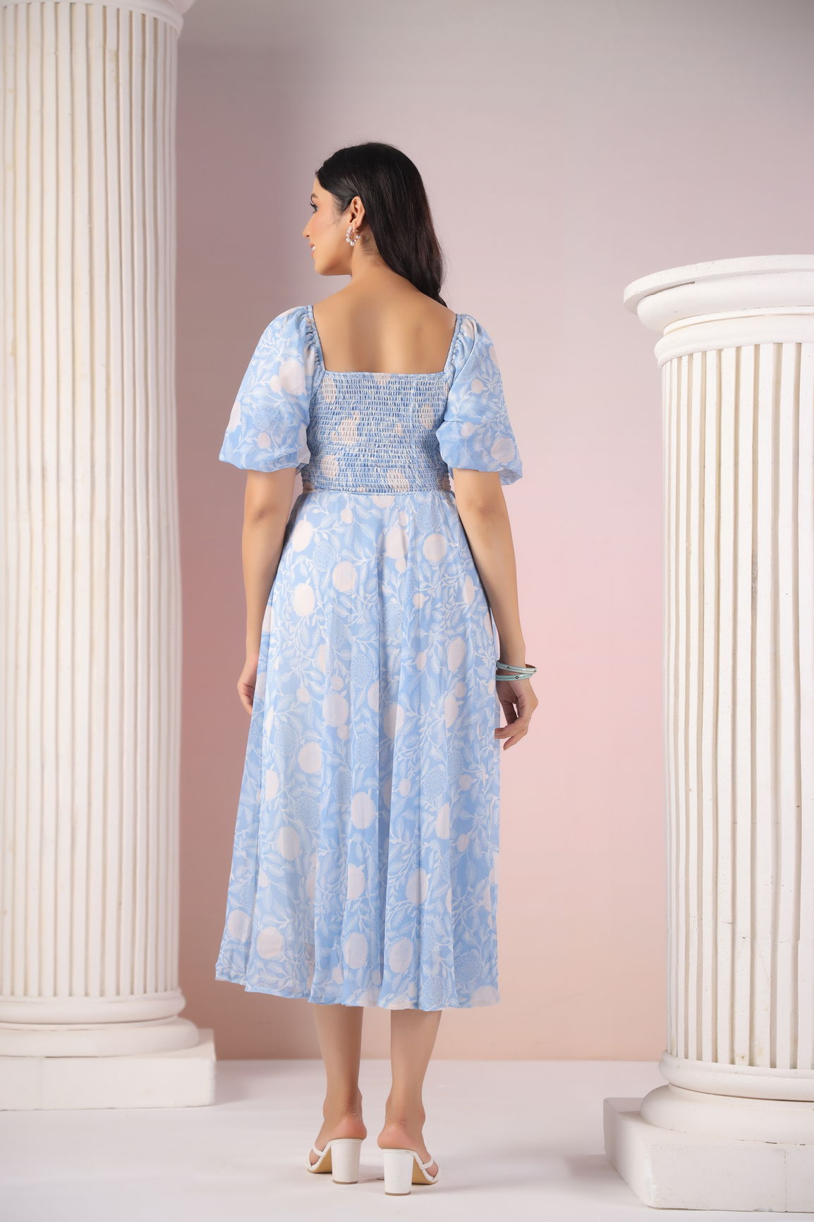Elegant sky blue and cream maxi dress showcasing feminine floral design.