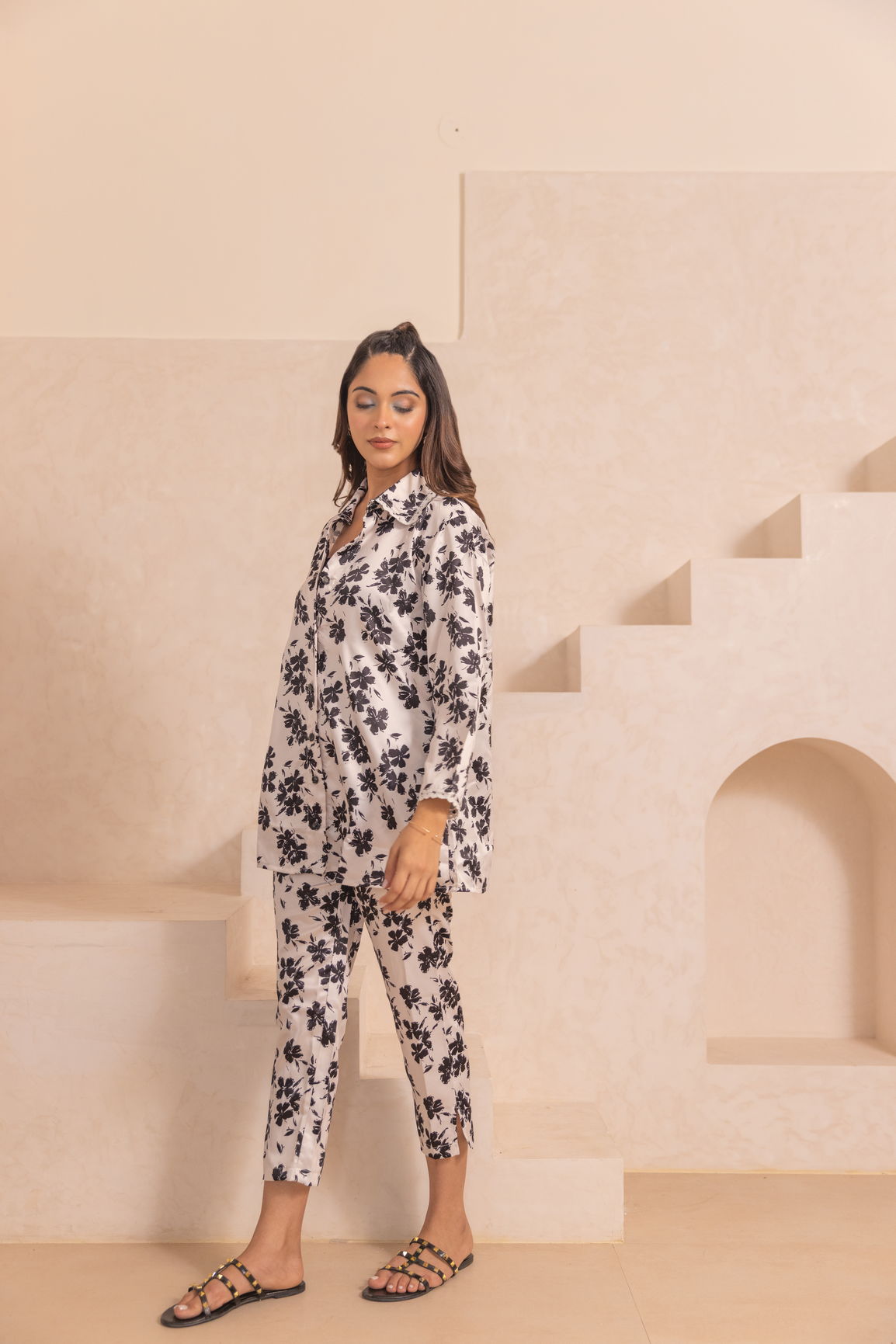 White floral satin co-ord set with stylish black patterns.