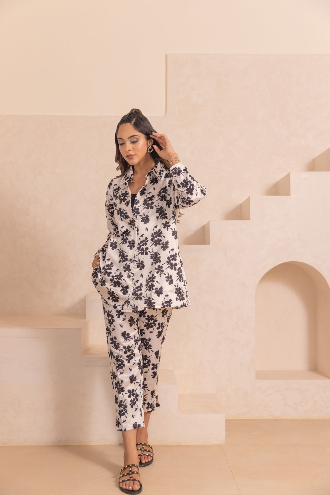 White floral satin co-ord set with stylish black pattern.