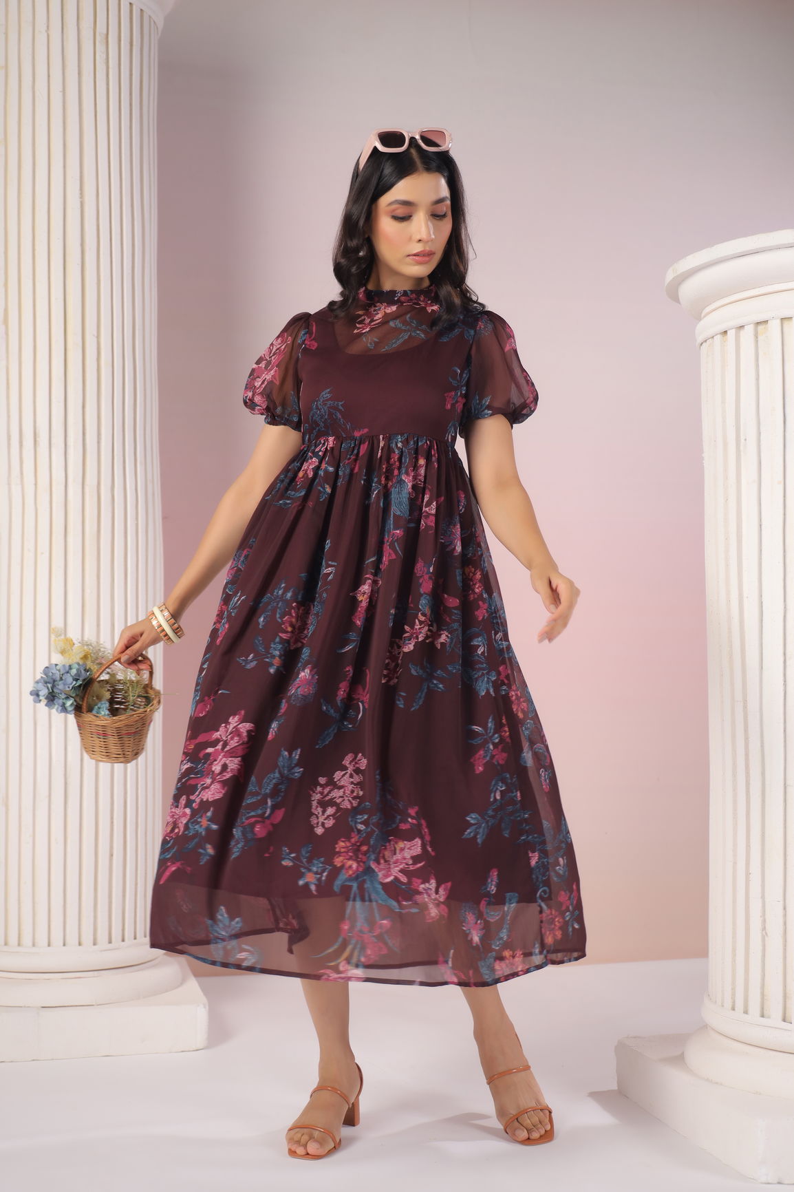Elegant floral maxi dress in wine color for stylish occasions.