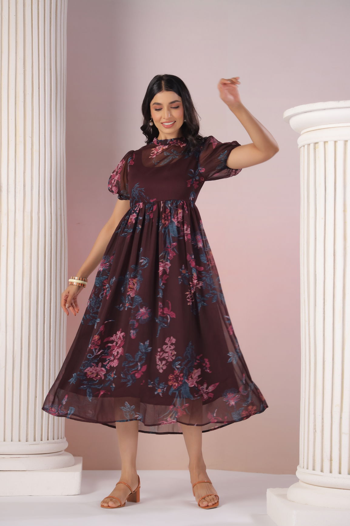 Elegant wine floral maxi dress with flutter sleeves and flowy silhouette.