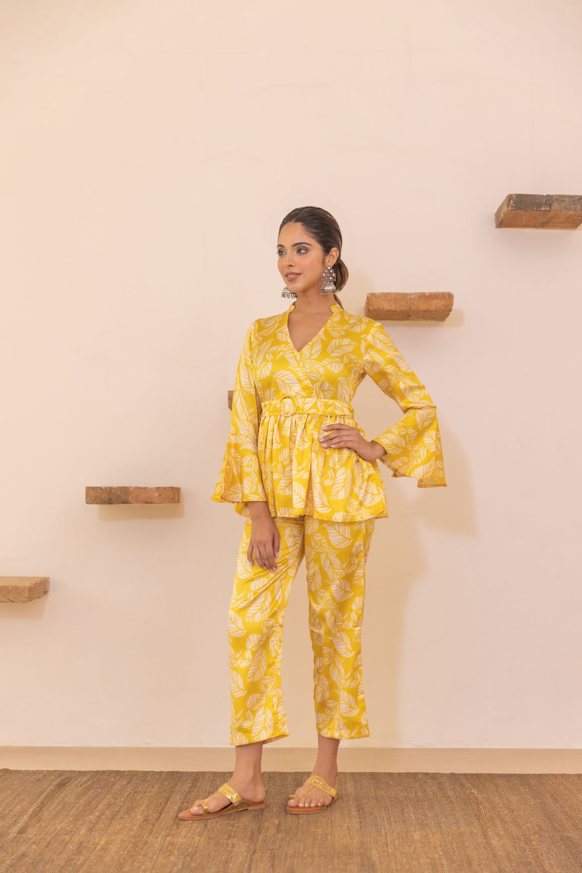 Yellow tropical satin co-ord outfit with floral print and flared sleeves.
