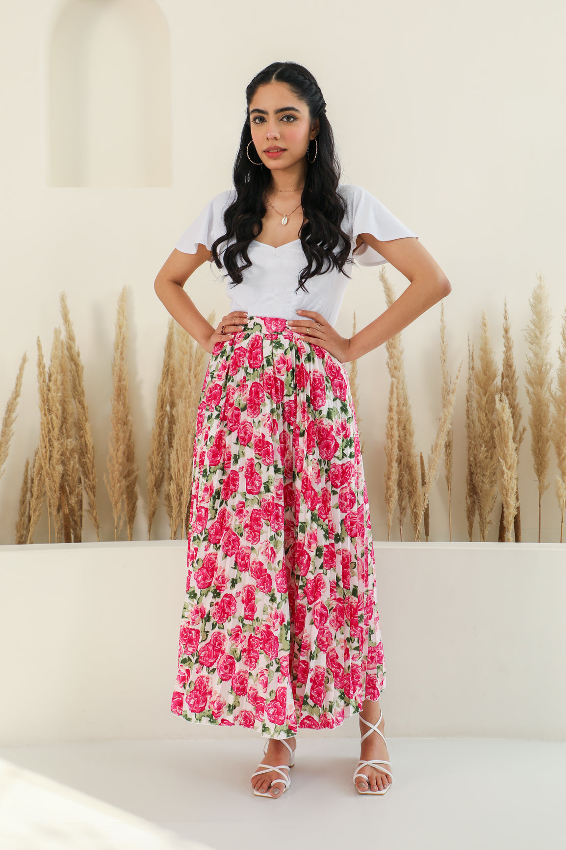 Floral pleated co-ord set with pink roses, ideal for summer styling.