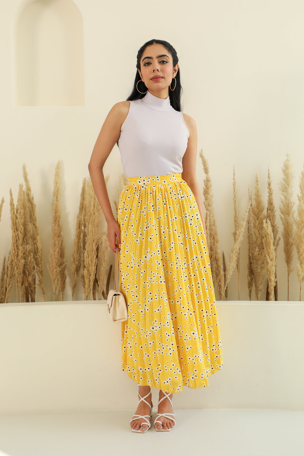 Stylish floral co-ord set with yellow skirt and top.