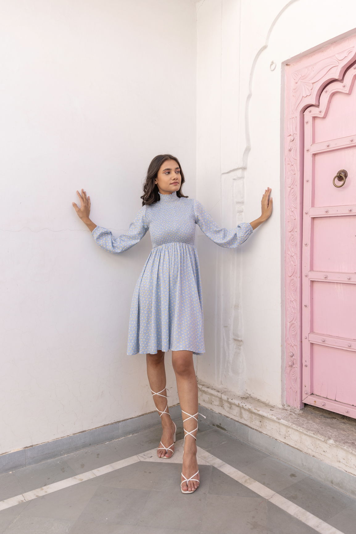Cotton smocked midi dress in light blue with stylish sleeves.