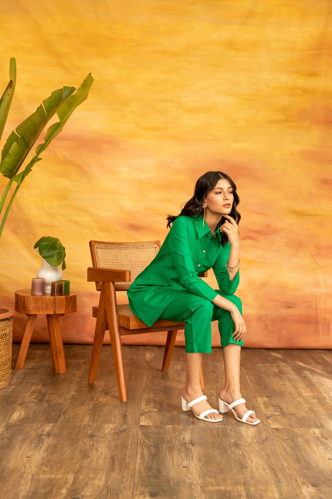 Elegant woman in green shamrock co-ord set, stylish and chic.