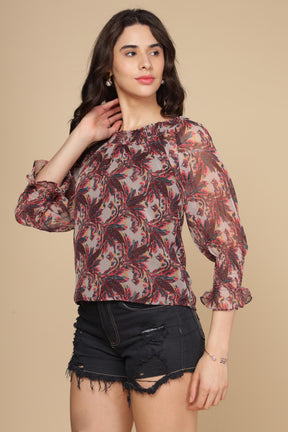 Elegant multi off-shoulder top with floral pattern and balloon sleeves.