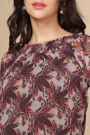 Multi off-shoulder top with floral pattern and elastic neckline.