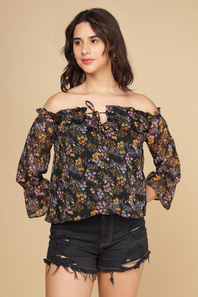 Stylish off-shoulder multi floral top with ruffled sleeves.