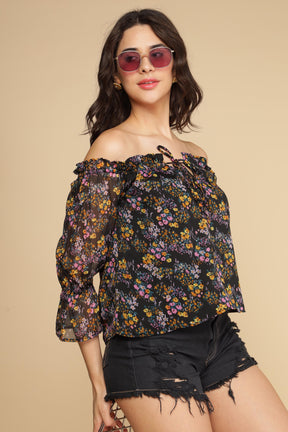 Multi Floral Top on model, stylish and trendy. Perfect for summer fashion.