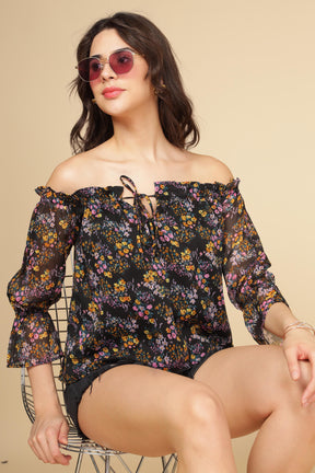 Multi Floral Top featuring off-shoulder design and vibrant floral print.