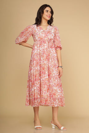 Pleated motif maxi dress in pink floral pattern, perfect for summer.