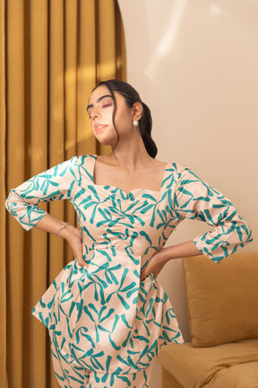 Beige abstract satin co-ord with turquoise patterned design.