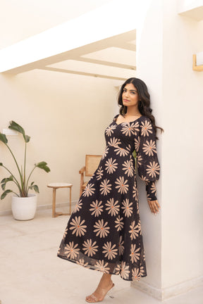 Black balloon sleeve dress with floral print, stylish and elegant.