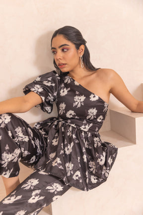 Black floral satin co-ord with stylish one-shoulder design.