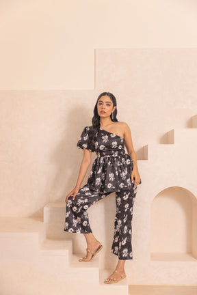 Black floral satin co-ord set featuring stylish one-shoulder design.