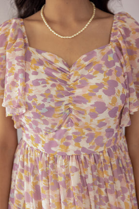 MOSAIC PRINT MAXI dress featuring floral patterns and elegant design.