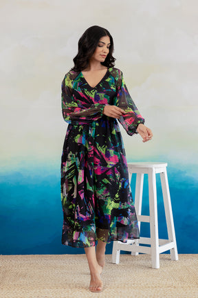 Black geometric print chiffon maxi dress on model.