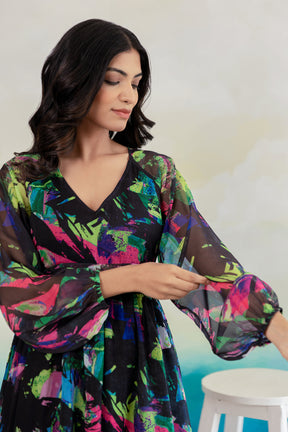Black geometric print chiffon maxi dress on model.