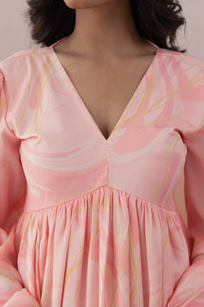 Stylish pink marble print maxi dress for women, elegant neckline design.