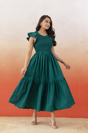 Emerald green cotton maxi dress with flounce sleeves, stylish and elegant.
