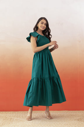 Emerald green cotton maxi dress with ruffled sleeves for summer.