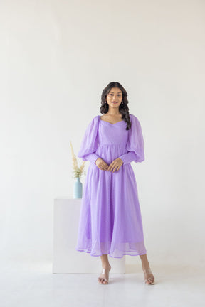 LILAC PRINCESS MAXI dress displayed by a stylish woman.