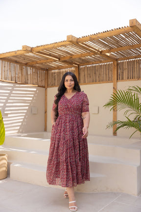 MOTIF MAXI POLAGO PLUS dress styled in natural light setting.