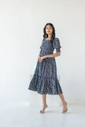 Navy mosaic cotton maxi dress on a model, stylish summer fashion.