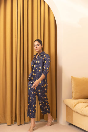 Navy satin co-ord outfit featuring floral print and modern styling.