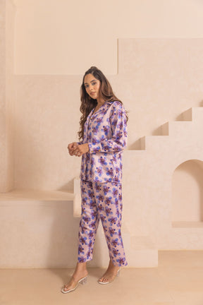 Pastel satin co-ord set featuring floral design and stylish model.