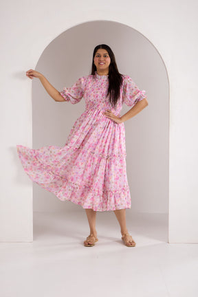 Pastel smocked maxi dress for women, stylish and feminine design.