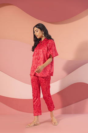Stylish pink satin co-ord set for fashionable women's wear.